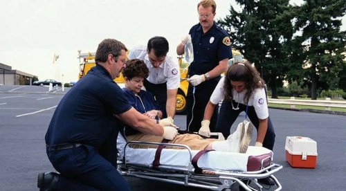 EMT team carrying a stretcher